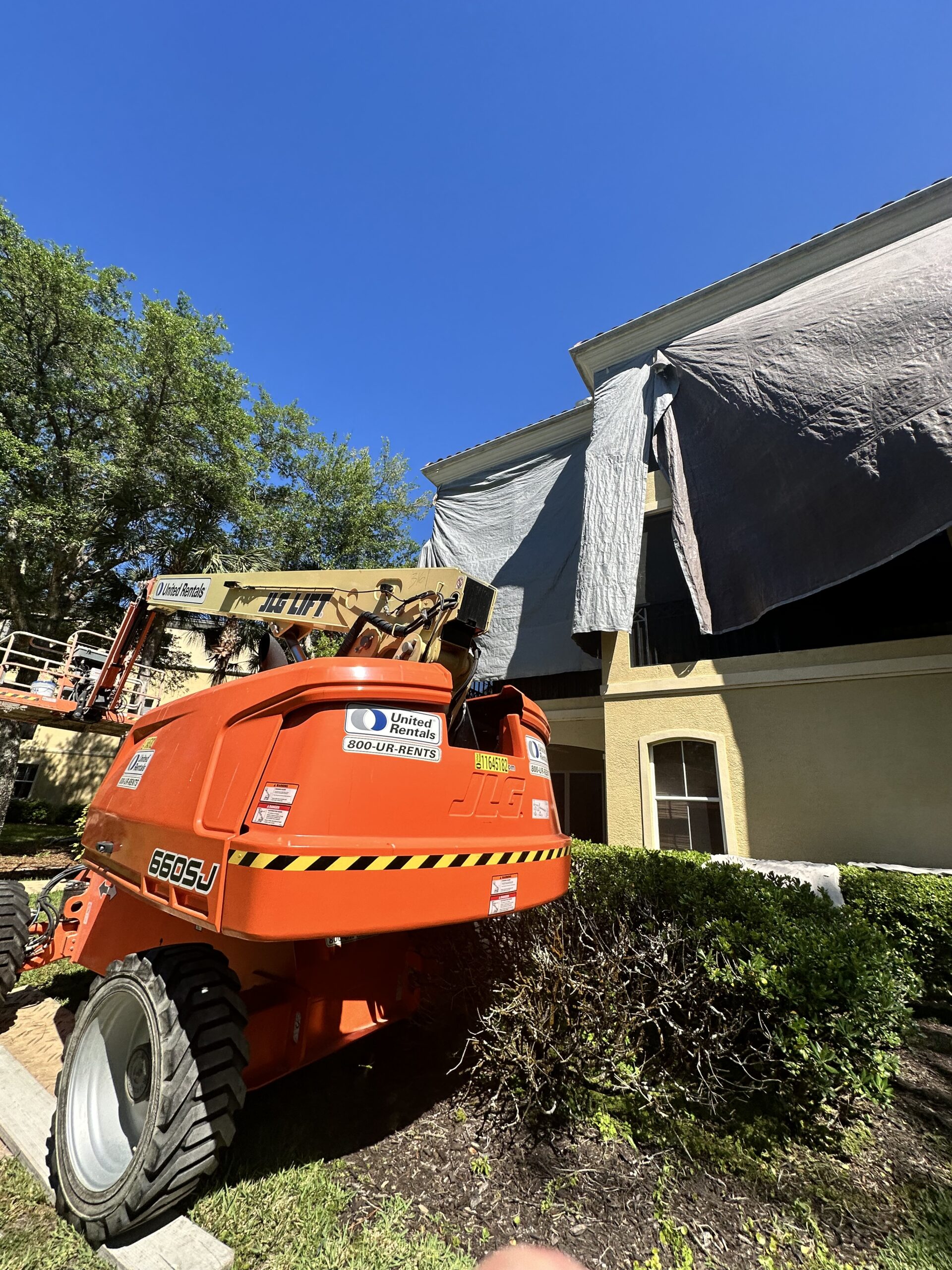 eifs moldings A construction truck parked in front of a house.